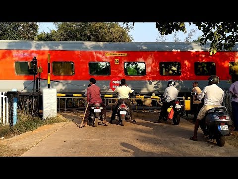 Rajdhani Express Thrashes a Railroad Level Crossing