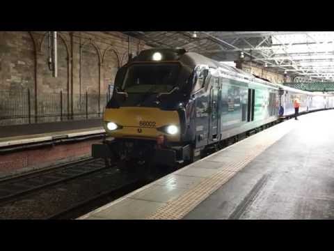 DRS 68 departs Edinburgh Waverley.