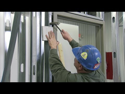 How to install a steel door frame in steel stud construction