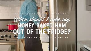 When should I take my Honey Baked Ham out of the fridge?