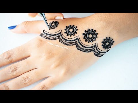 new stylish back hand mehndi design by creative heart