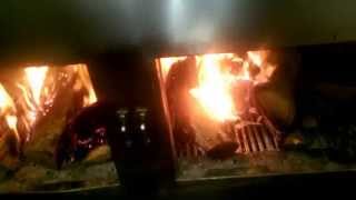 Firing up the custom made grill ~ Oswego Grill