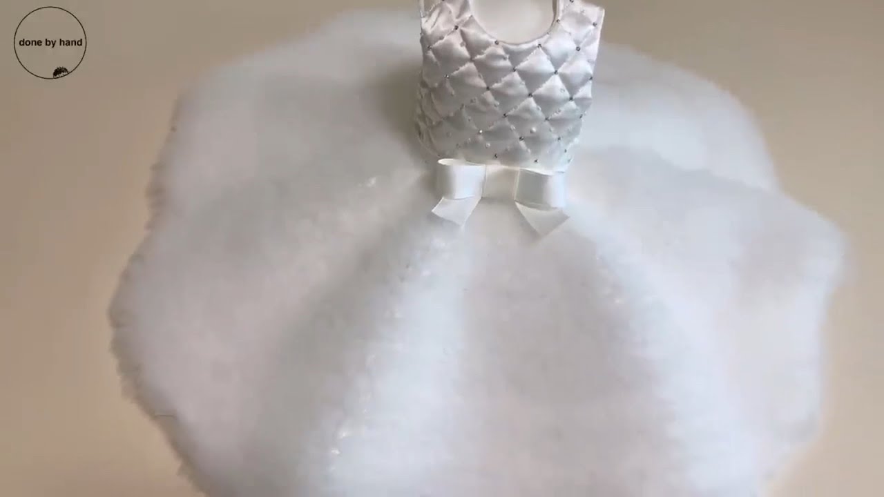 The process of making a baby tulle dress. 