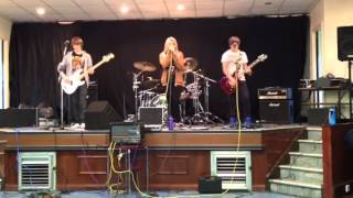 The volts band rehearsing we will rock you