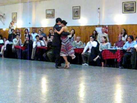  Maria Ines Bogado  and  Sebastian Jimenez  are  dancing  to  the  tango  "  Amarras  "