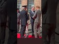 meghan pushing harry out of the way