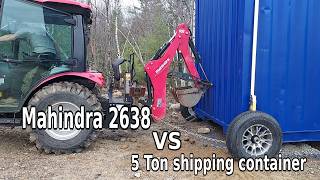 Installing a wheel kit on the shipping container to move it
