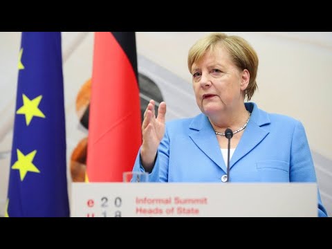 Merkel speaks out at press conference during technical problems