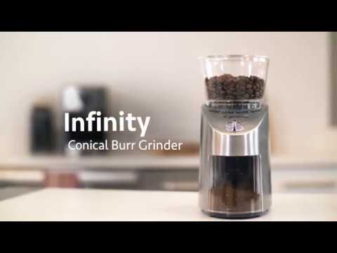Capresso 575.05 Infinity Automatic Conical Burr Coffee Grinder (Stainless Steel) with Coffee and Brush