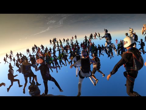 Attempting a 200 way skydiving formation at sunset