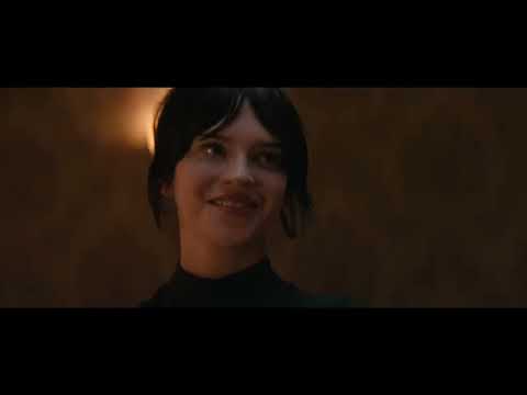 Heretic trailer frame: a close-up on a door chain sliding into place, underscoring the trap motif