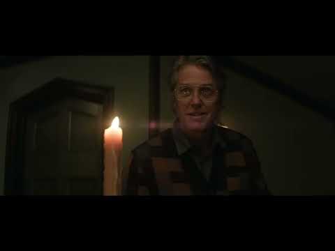 Heretic official A24 trailer frame: Mr. Reed’s dim hallway with a door ajar and light bleeding through