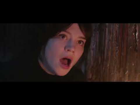 Heretic trailer frame: a staircase vanishing into shadow, echoing the score cue 'Stairs'