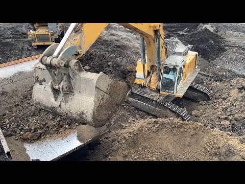 Liebherr 974 Excavator Loading Caterpillar 775E And 773B Dumpers-Sotiriadis/Labrianidis Mining Works
