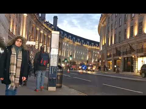 Illuminated City Buildings At Dusk