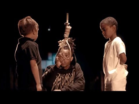 Click to Watch the Thug produces video that shows him lynching a child, YouTube responds by banning Bible readings video