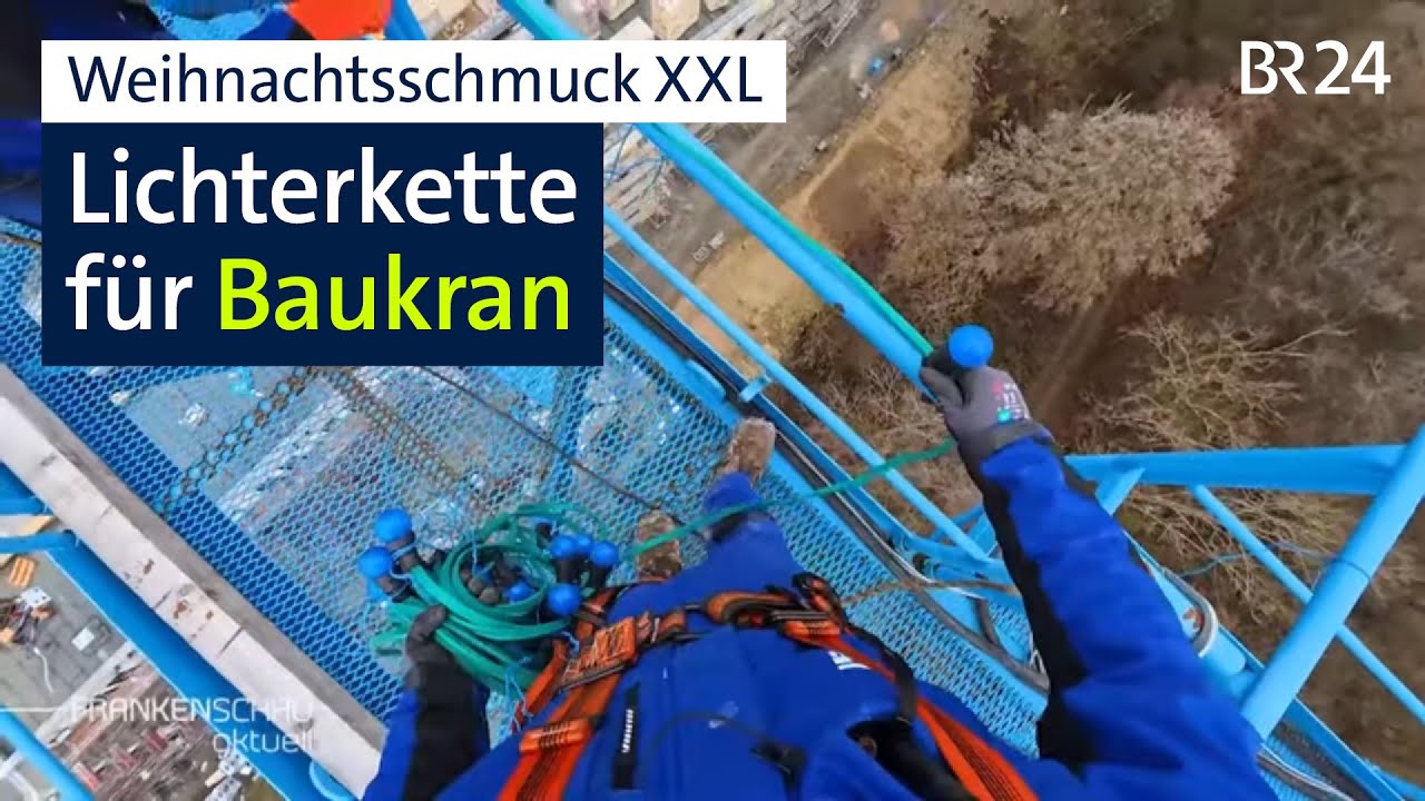 Baukran soll weihnachtlich leuchten: Lichterkette in luftiger Höhe installiert | BR24