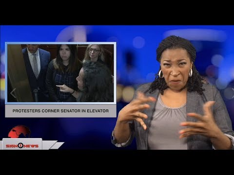 Protesters corner senator in elevator (ASL - 9.28.18)