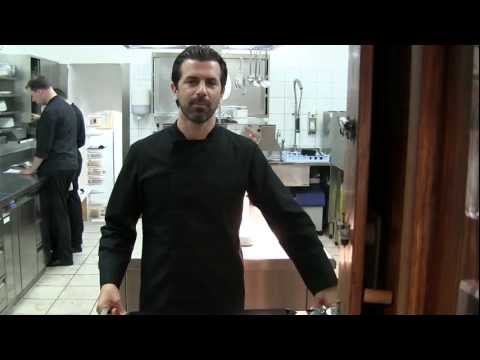 Andreas Caminada prepares a dish at Schauenstein