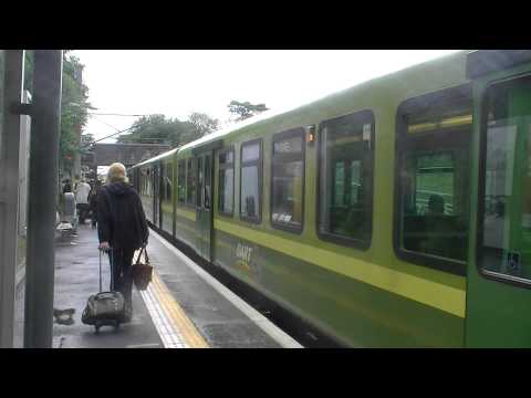 Irish Rail 8100 EMU 8115 + 8113 + 8116 + 8114 arrives and a 29000 DMU 29024 arrives at Portmarnock