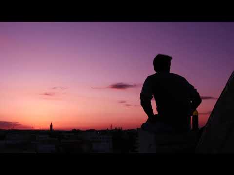 Silhouette of a Man Sitting on the Roof 🌆 | Royalty Free Stock Footage Video No Copyright 🚫