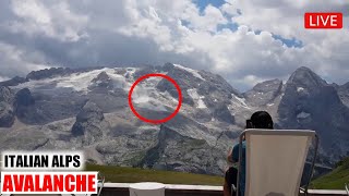 Glacier Collapse in Italian Alpes at Dolomite summit Marmolada