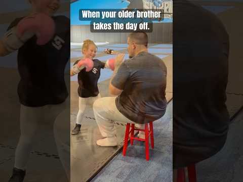 Brother photobombs sister’s boxing lesson #lovelylucy #sweetlew #boxing #funny #siblinggoals