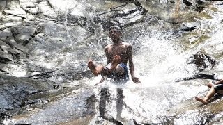 preview picture of video 'Boys sliding down Lata Bayu Waterfall, Kedah | Malaysia'