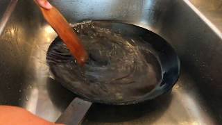 Cleaning gooey and burnt food on carbon steel pan