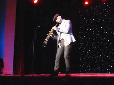 Julian Smith playing (Bolero) on a soprano saxophone