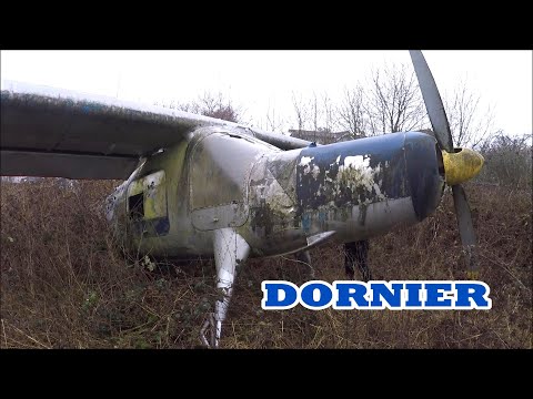 Abandoned Dornier Do 27 on a Field