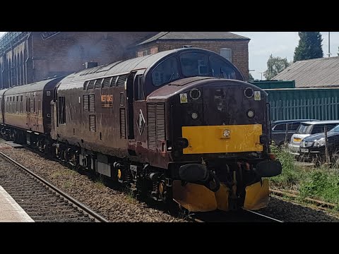 37706 + stock pass Kidderminster working 5Z57 1210 Kidderminster S.V.R. to Carnforth Steamtown