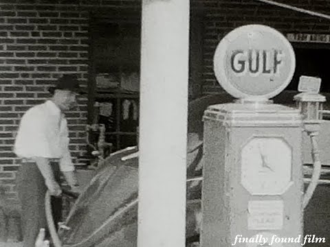 Vintage 1930s or 1940s guy pumping gas 8mm home movie...