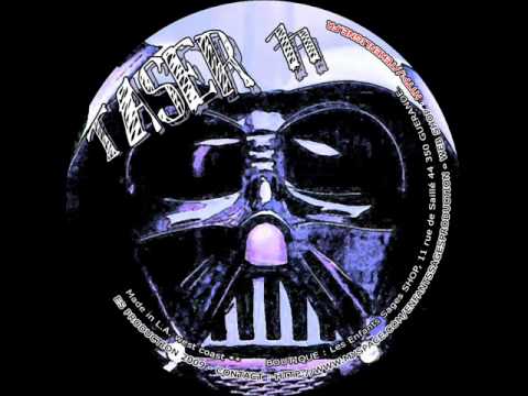 TASER 11 - Adrenokrome - "Reste En Place Man"