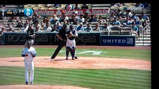 Major leaguer adjusting his cup on tv
