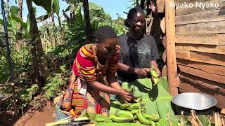 Cooking the famous matooke and peanut powder For Lunch / African village life