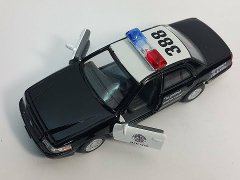 Металлическая машинка Kinsmart 1:42 «Ford Crown Victoria Police Interceptor» KT5327D инерционная / Черная