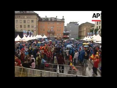 WRAP Spanish and Russian fans watch match ADDS post-match reax