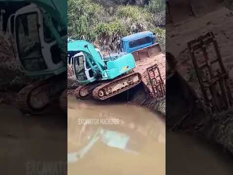 The excavator fell into the pond from the trailer #shorts
