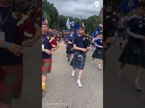 Duck wearing Scottish flag leads march through Rhode Island