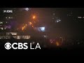 Los Angeles police detain crowd near Hollywood Hills homes