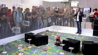 Collaboration between Ground and Flying Robots for Search-And-Rescue Missions