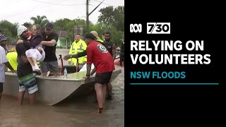 Why did volunteers have to fill critical gaps in flood rescues? | 7.30