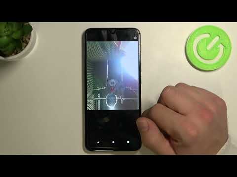 How to Turn On / Turn Off Touch to Capture on MOTOROLA Moto E20 Camera