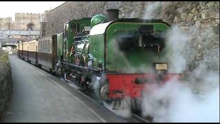 preview picture of video 'Welsh Highland Railway  No 138 'Mileniwm' departs Caernarfon'