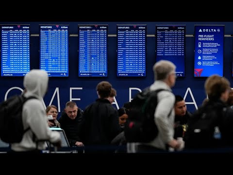 Travelers react to campaign urging passengers to ‘dress up’ at airport ahead of record travel wee...