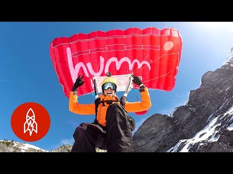 定點跳傘 + 高山滑雪 = 極限滑雪跳傘 (Base Jumping + Mountain Skiing = Extreme Ski-Base Jumping)