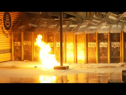 Protesters clash with police, demand justice for Mexico's 43 missing students | AFP