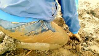 Barefoot in my boots and stuck in waist deep mud!!
