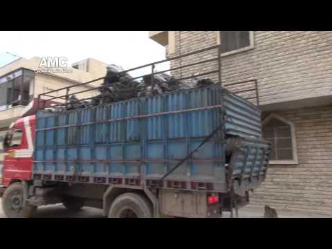 أحد السيارات المسروقات بمقر كتيبة حسن جزرة والتي صادرتها الهيئة الشرعية في مدينة حلب